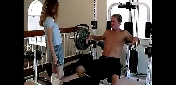  Skinny barely legal slut Anne Howe sucks a hard cock on a weight bench then gets drilled